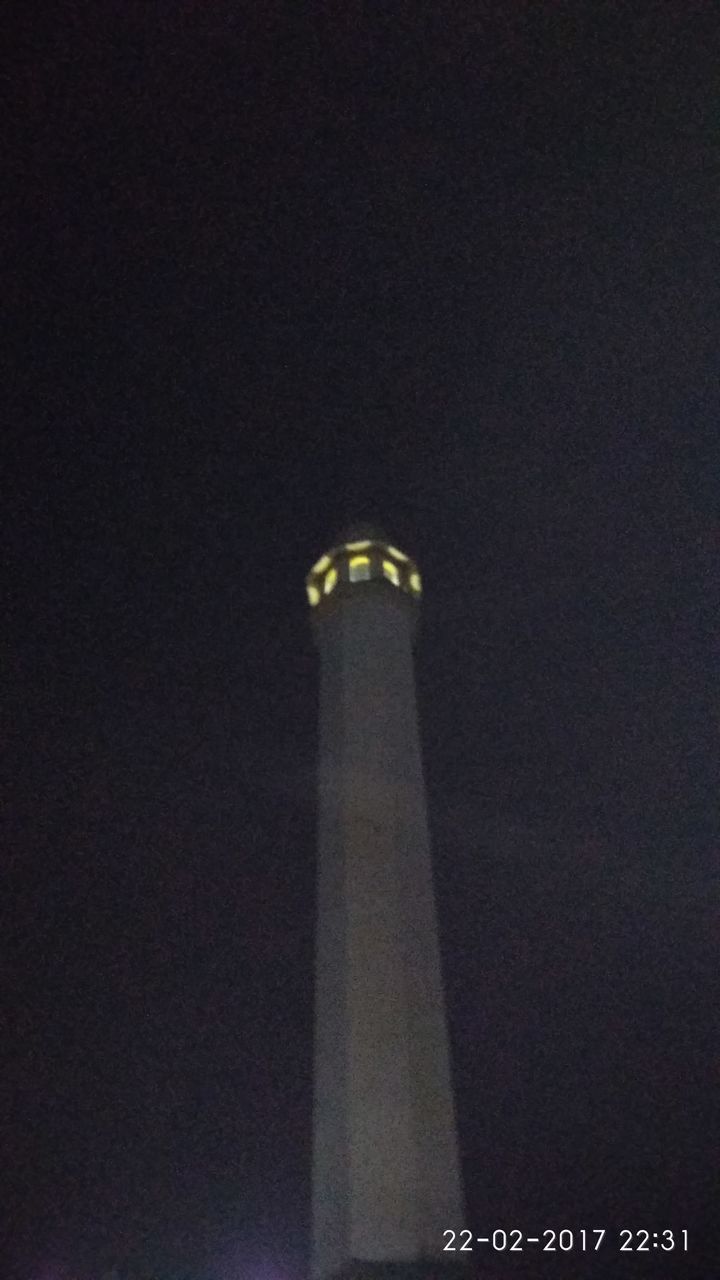 low angle view, built structure, night, technology, architecture, illuminated, no people, lighting equipment, electricity, building exterior, futuristic, outdoors, nature, sky, tower, galaxy