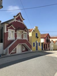 Low angle view of buildings in city, house beach in costa nova, aveiro, portugal
