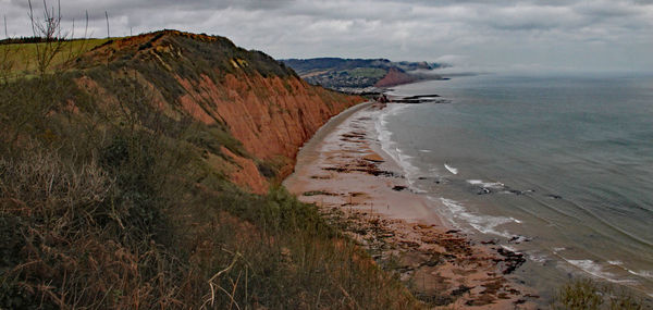 Scenic view of beach against sky