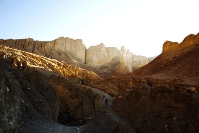 Panoramic view of mountains against clear sky