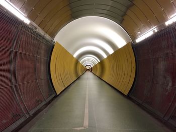 Interior of illuminated subway station