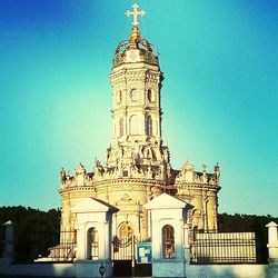 Low angle view of church against blue sky