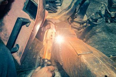 High angle view of man working on wood