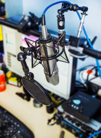 Close-up of chain hanging against ceiling