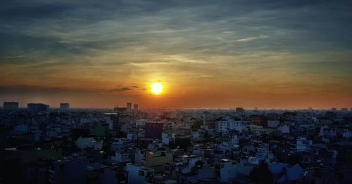 High angle view of townscape against sky during sunset