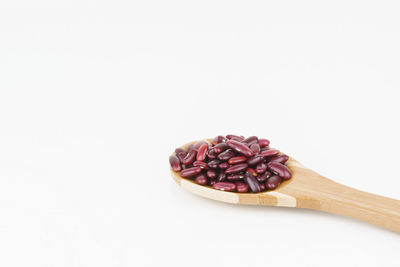 Close-up of cake against white background