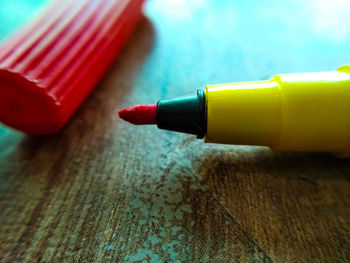 Close-up of colored pencils on table