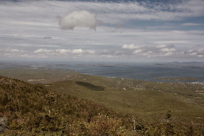 Scenic view of land against sky