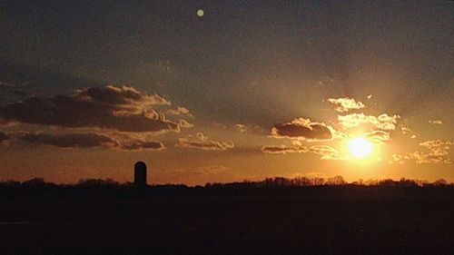 Scenic view of sunset over landscape