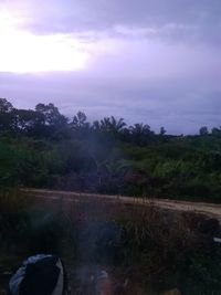 Scenic view of landscape against sky during sunset