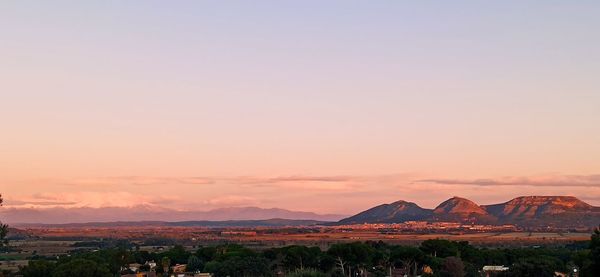 Scenic view of landscape against sky during sunset