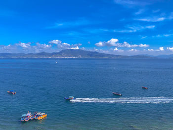 Scenic view of sea against blue sky