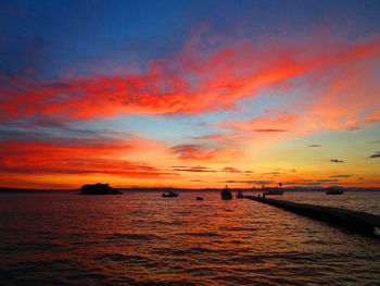 Scenic view of sea at sunset
