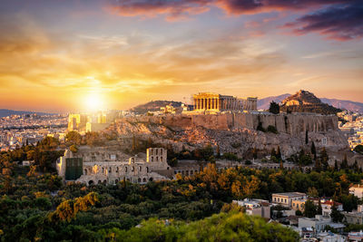 High angle view of townscape against sky at sunset