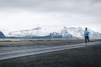 Man jogging in mountains  on the move