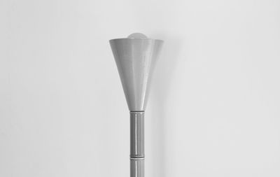 Close-up of electric lamp against white background