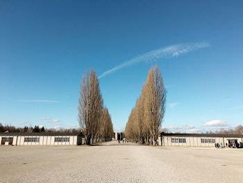 Panoramic shot of land against blue sky