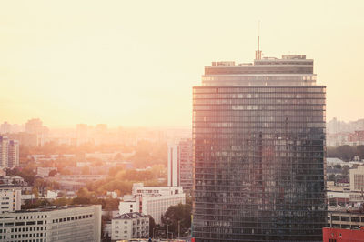 Modern buildings in city against sky