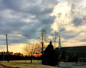 Silhouette bare trees against sky during sunset