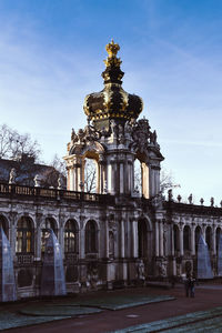 Statue of historic building against sky