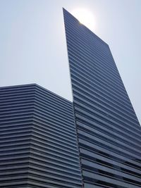 Low angle view of modern building against clear sky