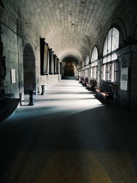 Empty corridor along buildings