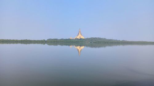 Scenic view of lake against clear sky