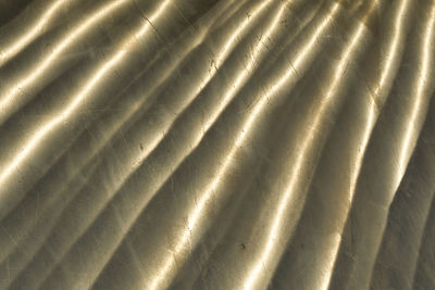 Full frame shot of pattern shadow on metal