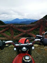 Vintage car on mountain against sky