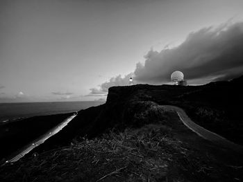 Scenic view of sea against sky at dusk