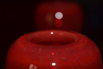 Close-up of red wine in water