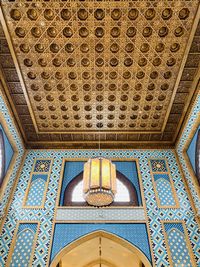 Low angle view of ornate ceiling in building