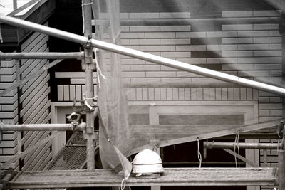 Side view of man working on staircase