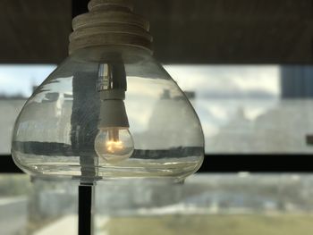 Close-up of illuminated light bulb