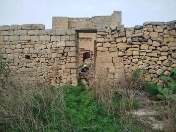 View of old ruins against sky
