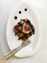 High angle view of dessert in plate on table