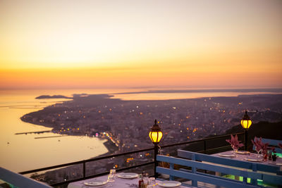 High angle view of city at sunset