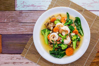 High angle view of salad in bowl on table