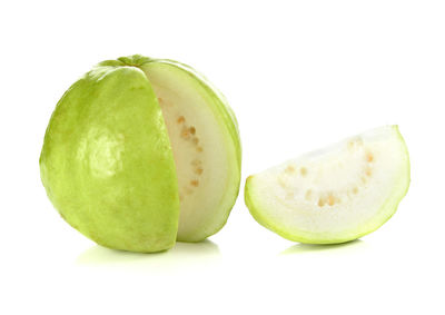 Close-up of fruits against white background