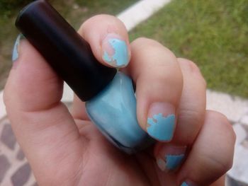 Close-up of man holding hands