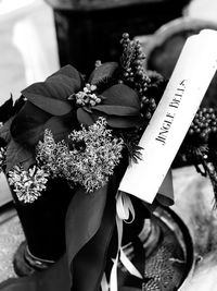 Close-up of woman holding flower bouquet