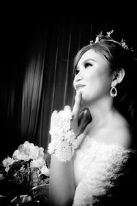 Portrait of young woman looking down