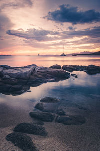 Scenic view of sea against sky during sunrise