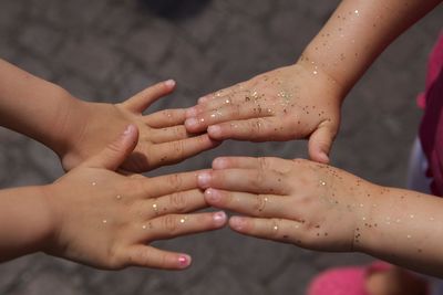 Close-up of hand holding glass