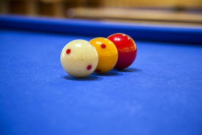 Close-up of snooker balls on table