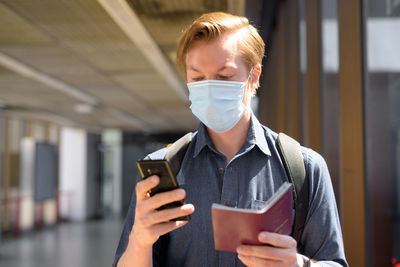 Young man using mobile phone