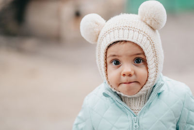 Portrait of cute boy wearing hat