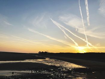 Scenic view of silhouette landscape against sky during sunset