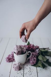 Cropped hand of person holding food. testy food. deserts 