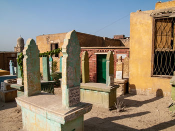 Exterior of old building against sky on sunny day